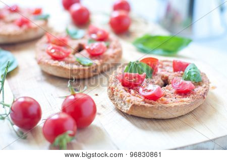 Friselle typical Italian bruschetta with corn tomato and basil