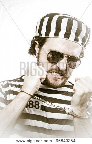 Lawbreaker, Desperate, portrait of a man prisoner in prison garb, over white background