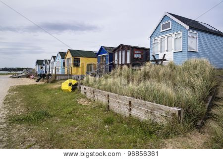 Lovely Beach Huts On Sand Dunes And Beach Landscape