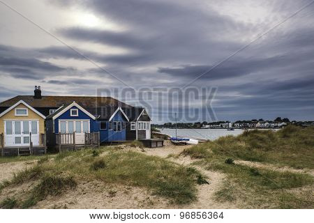 Lovely Beach Huts On Sand Dunes And Beach Landscape