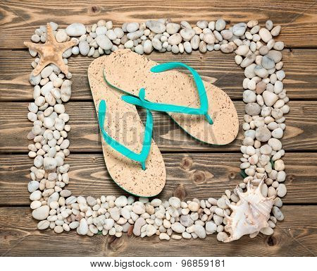 Frame from sea shells and stones