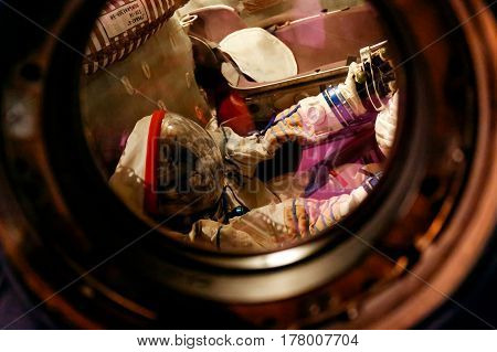 MOSCOW, RUSSIA - JUNE 12, 2016: Russian/USSR astronaut in a spacesuit inside a capsule on exhibit at Moscow Space Museum
