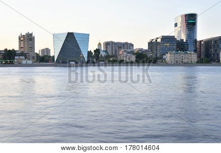 Neva River and Modern building business center on Malookhtinskaya embankment in St.Petersburg before dawn.