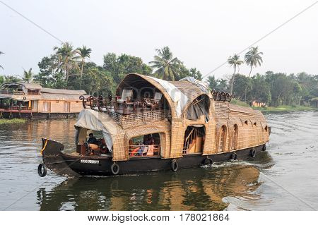Traditional Indian Houseboat Cruising Near Alleppey On Kerala Backwaters