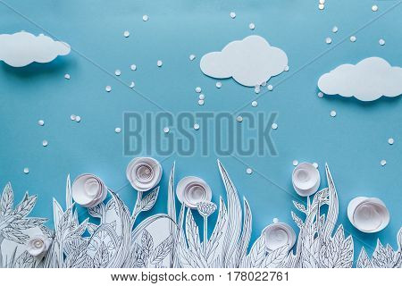 Paper Art And Origami Concept Of Flower Meadow. White Paper Flower On Blue Background