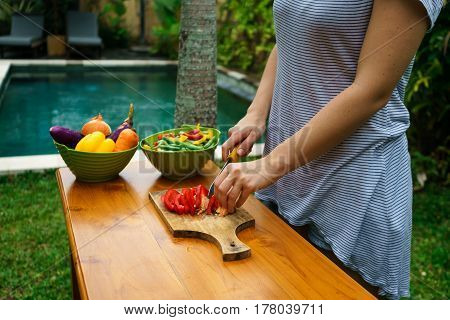 Culinary Workshop. Vegetable Salad With Own Hands In The Courtyard Of A Private House.