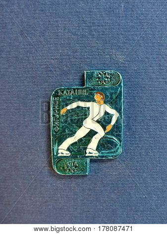USSR - CIRCA 1980: Badge with a picture of a figure skater and the inscription 