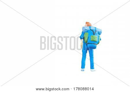 Close Up Of Miniature Backpacker And Tourist People Isolated With Clipping Paht On White Background.