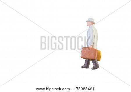 Close Up Of Miniature Businessman And Tourist People Isolated With Clipping Paht On White Background