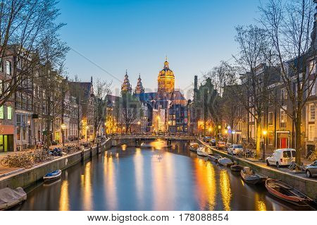 Church Of Saint Nicholas In Amsterdam City At Night In Netherlands