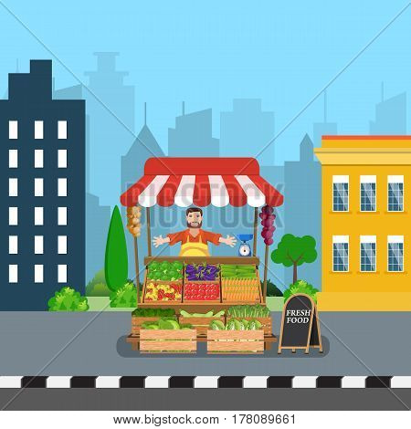 male street vendor selling vegetables from his stall on city street