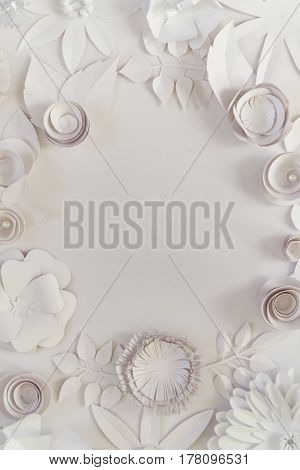 Round Frame With White Paper Flowers On White Background.