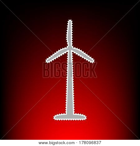 Wind turbine logo or sign. Postage stamp or old photo style on red-black gradient background.