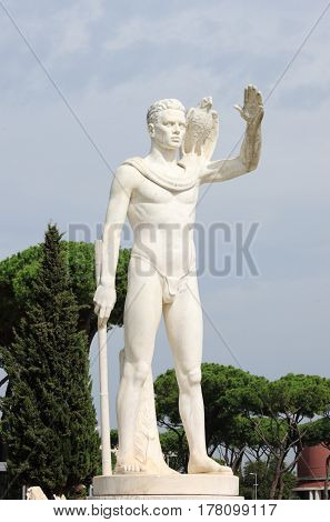 Statue of a falconer in the Foro Italico district of Rome, Italy