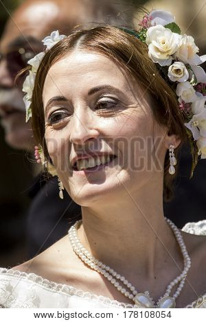 CAGLIARI, ITALY - May 29, 2016: Sunday at La Grande Jatte VIII Ed. At the Public Gardens - portrait of a beautiful woman in Victorian costumes - Sardinia