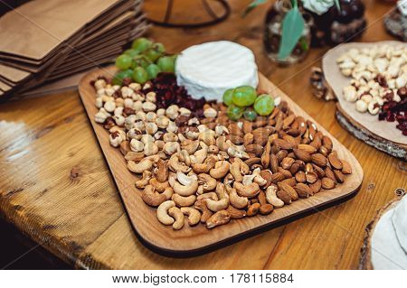 Candy Bar. Delicious sweet buffet with cupcakes. Sweet holiday buffet with cupcakes and other desserts.Table with sweets, candies, dessert