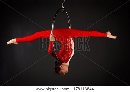 Woman Exercising On Lyra