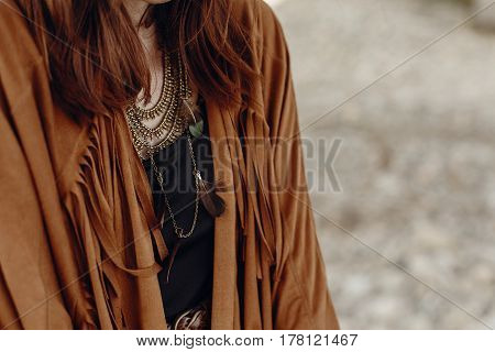 Stylish Boho Woman Look. Gypsy Hipster Girl In Fringe Jacket With Feather Bronze Accessory. Wanderlu
