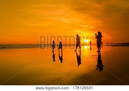 Sunset and silhouette at Parangtritis Beach, Central Java Indonesia