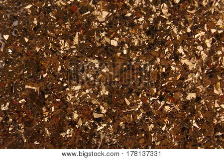 golden glass granules background texture vintage toned