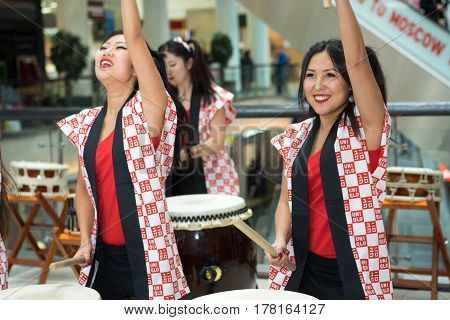 Moscow, Russia - March 25, 2017: Group Of Japanese Taiko Drummers Girls Perform In Kaleidoscope Shop