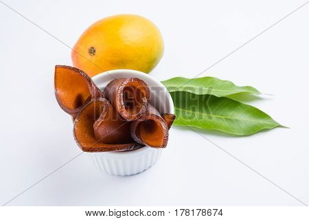 indian alphonso mango's dried jelly called mango papad or mango poli or slab or cake, traditional maharashtrian recipe