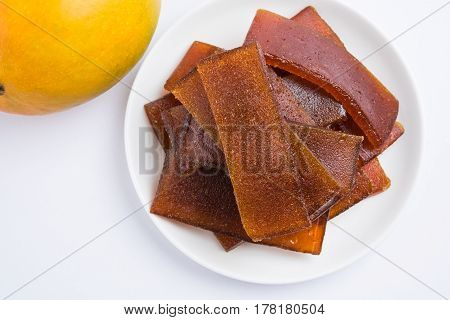 indian alphonso mango's dried jelly called mango papad or mango poli or slab or cake, traditional maharashtrian recipe