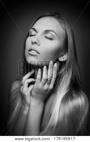 monochrome Portrait of beautiful woman on beige background