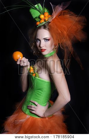 portrait of a girl with fashion makeup on a black background