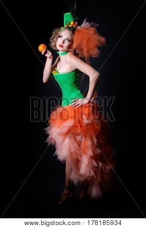 full-length portrait of a girl with fashion makeup on a black background