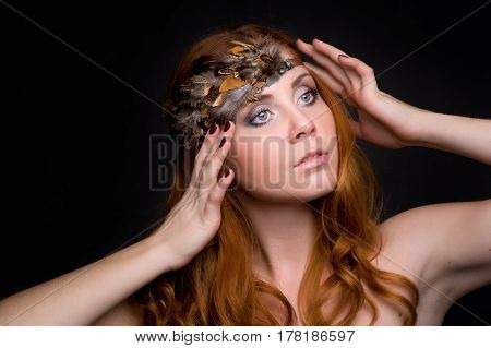 Closeup portrait of a redhead female model