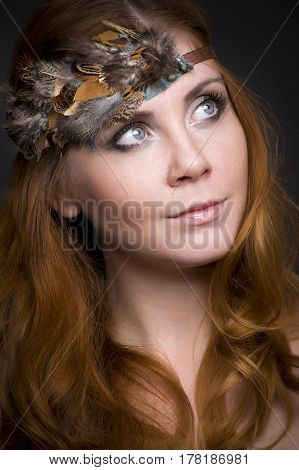 Closeup portrait of a redhead female model