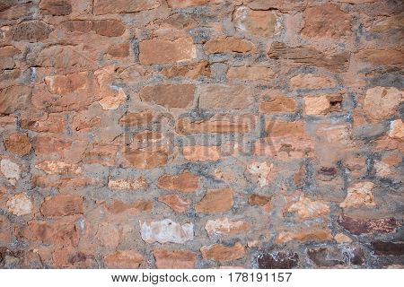 Orange Stone with Mortar Thick Between Them