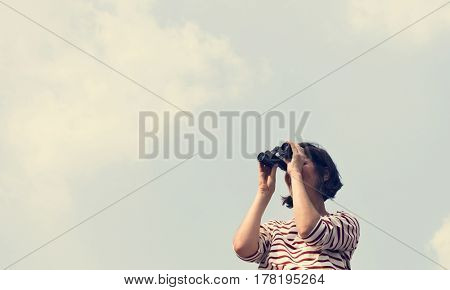 Woman using binocular explore searching