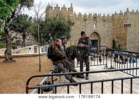 JERUSALEM ISRAEL - MARCH 25 2017: Israeli border patrol near the Shekhem (Damascus) gate in the old city of Jerusalem