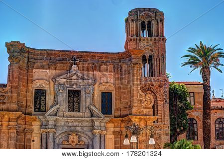Belltower of church Martorana with palm trees, Palermo. Sicily. Beautiful architecture of the historical district.
