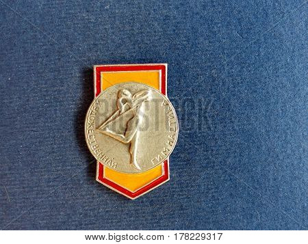 USSR - CIRCA 1979: Badge with a picture of a gymnast and the inscription 