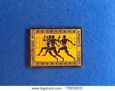 USSR - CIRCA 1980: Badge with the image of the an ancient sportsmanl and the inscription 