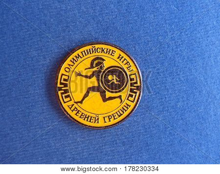 USSR - CIRCA 1980: Badge with the image of the an ancient athlete and the inscription 