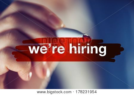 We're hiring concept businesswoman highlighting the announcement