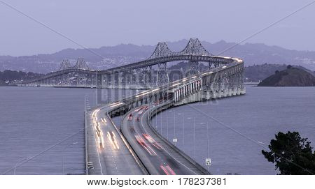 Dusk Over The Richmond-San Rafael Bridge. Shot from San Quentin Point, Marin County, California, USA.