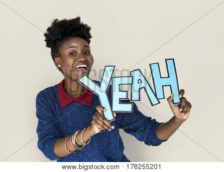 Smiling African Woman Holding Yeah Word