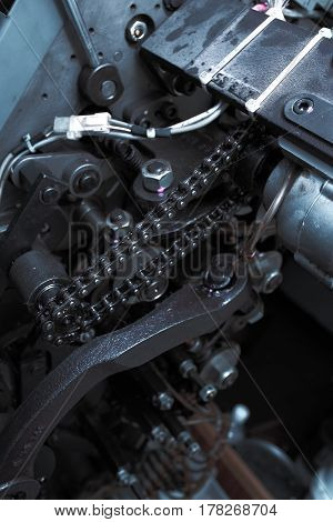 Mecahnical chain in industrial machinery. Macro photo