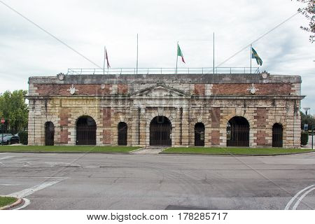 View of Porta Nuova gate from the side of Corso Porta Nuova avenue in Verona Italy.