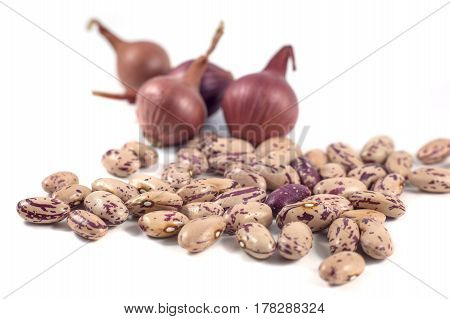 Colorful Beans And Onion Isolated On White Background