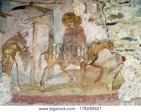 CASTELSEPRIO, ITALY - JUNE 25, 2016: The archeological area of Castelseprio (Varese Lombardy Italy): ruins of a village destroyed in the 13th century. Unesco World Heritage Site. The church mural paintings.