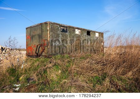 The old abandoned metal shed for builders.