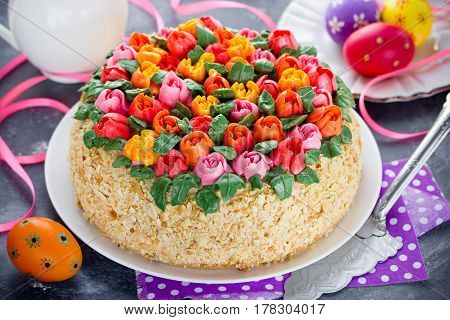 Buttercream flower tulip cake beautiful festive cake decorated with colorful cream flowers for Easter