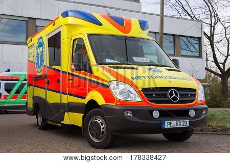 PEINE / GERMANY - MARCH 20 2017: german ambulance vehicle stands on hospital at peine / germany