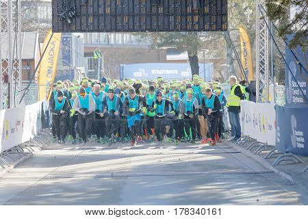 STOCKHOLM SWEDEN - MAR 25 2017: Running people after the start in the Stockholm Tunnel Run Citybanan 2017. March 25 2017 in Stockholm Sweden